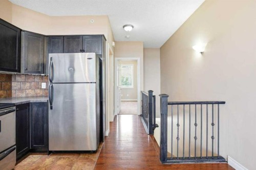 11-148 Rockyledge View Nw, Calgary, AB - Indoor Photo Showing Kitchen