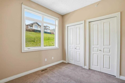 11-148 Rockyledge View Nw, Calgary, AB - Indoor Photo Showing Other Room