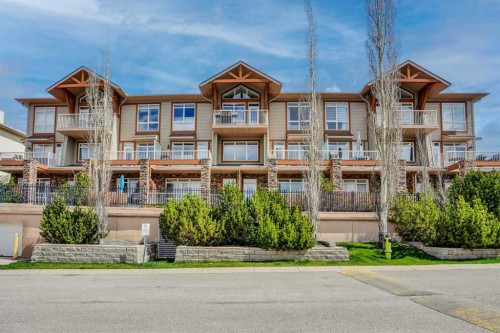 11-148 Rockyledge View Nw, Calgary, AB - Outdoor With Balcony With Facade