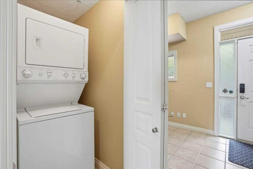 11-148 Rockyledge View Nw, Calgary, AB - Indoor Photo Showing Laundry Room