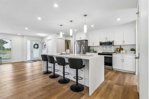 14517 Parkland Boulevard Se, Calgary, AB - Indoor Photo Showing Kitchen With Stainless Steel Kitchen With Upgraded Kitchen