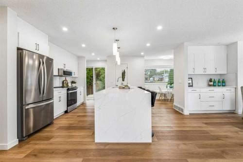 14517 Parkland Boulevard Se, Calgary, AB - Indoor Photo Showing Kitchen With Stainless Steel Kitchen With Upgraded Kitchen