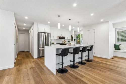14517 Parkland Boulevard Se, Calgary, AB - Indoor Photo Showing Kitchen With Stainless Steel Kitchen With Upgraded Kitchen