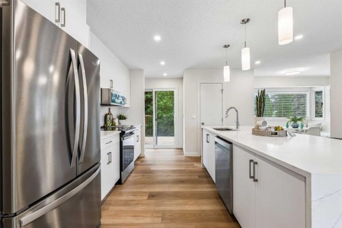 14517 Parkland Boulevard Se, Calgary, AB - Indoor Photo Showing Kitchen With Stainless Steel Kitchen With Upgraded Kitchen