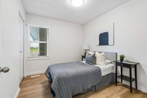 14517 Parkland Boulevard Se, Calgary, AB - Indoor Photo Showing Bedroom