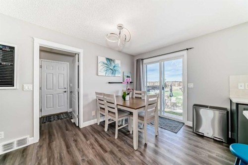 22 Moe Avenue Nw, Langdon, AB - Indoor Photo Showing Dining Room