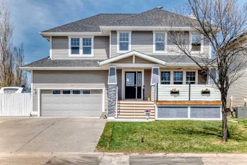 22 Moe Avenue Nw, Langdon, AB - Outdoor With Facade