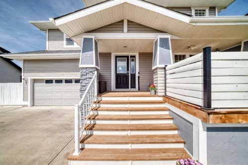 22 Moe Avenue Nw, Langdon, AB - Outdoor With Exterior