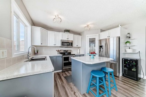22 Moe Avenue Nw, Langdon, AB - Indoor Photo Showing Kitchen With Stainless Steel Kitchen With Double Sink