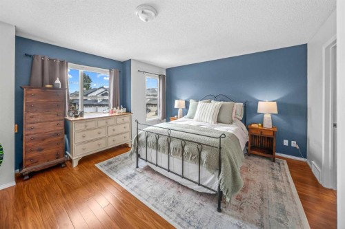 43 Cougar Ridge Bay Sw, Calgary, AB - Indoor Photo Showing Bedroom