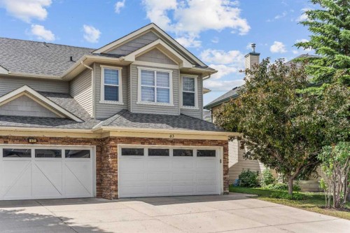 43 Cougar Ridge Bay Sw, Calgary, AB - Outdoor With Facade