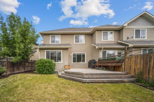 43 Cougar Ridge Bay Sw, Calgary, AB - Outdoor With Deck Patio Veranda