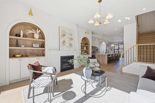 2023 27 Avenue Sw, Calgary, AB - Indoor Photo Showing Living Room With Fireplace