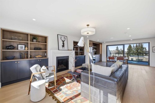 2023 27 Avenue Sw, Calgary, AB - Indoor Photo Showing Living Room With Fireplace