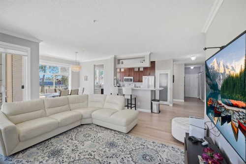 3137-1010 Arbour Lake Road Nw, Calgary, AB - Indoor Photo Showing Living Room
