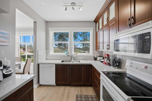 3137-1010 Arbour Lake Road Nw, Calgary, AB - Indoor Photo Showing Kitchen With Double Sink