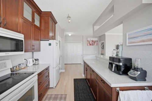 3137-1010 Arbour Lake Road Nw, Calgary, AB - Indoor Photo Showing Kitchen