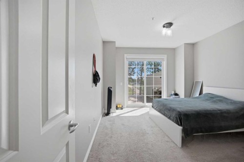 3137-1010 Arbour Lake Road Nw, Calgary, AB - Indoor Photo Showing Bedroom