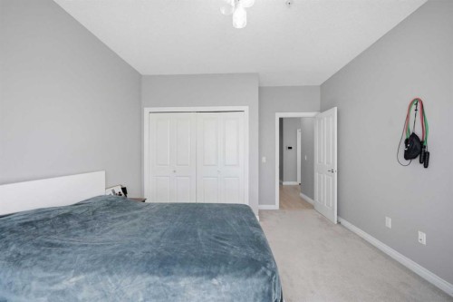 3137-1010 Arbour Lake Road Nw, Calgary, AB - Indoor Photo Showing Bedroom