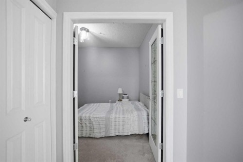 3137-1010 Arbour Lake Road Nw, Calgary, AB - Indoor Photo Showing Bedroom