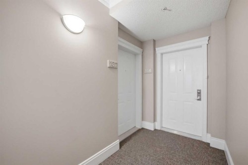 3137-1010 Arbour Lake Road Nw, Calgary, AB - Indoor Photo Showing Other Room