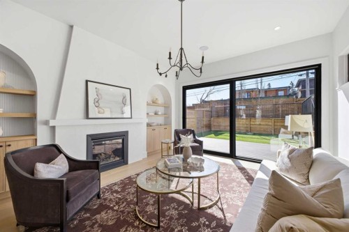 2025 27 Avenue Sw, Calgary, AB - Indoor Photo Showing Living Room With Fireplace
