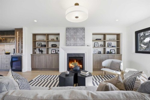 2025 27 Avenue Sw, Calgary, AB - Indoor Photo Showing Living Room With Fireplace