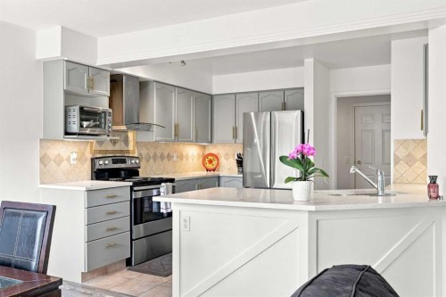 454 Millrise Square Sw, Calgary, AB - Indoor Photo Showing Kitchen With Double Sink