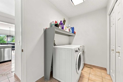 454 Millrise Square Sw, Calgary, AB - Indoor Photo Showing Laundry Room