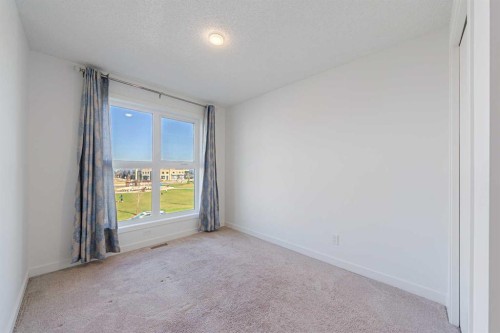 83 Savanna Park Ne, Calgary, AB - Indoor Photo Showing Other Room