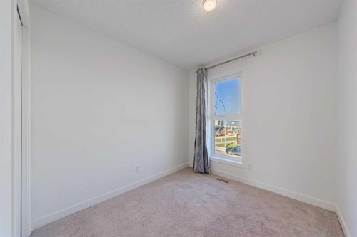 83 Savanna Park Ne, Calgary, AB - Indoor Photo Showing Other Room