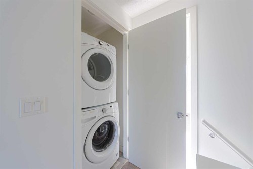83 Savanna Park Ne, Calgary, AB - Indoor Photo Showing Laundry Room