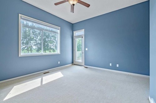 315 Willow Ridge Way, Diamond Valley, AB - Indoor Photo Showing Other Room