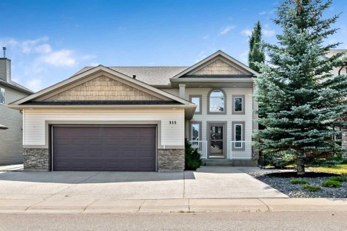 315 Willow Ridge Way, Diamond Valley, AB - Outdoor With Facade