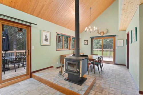 5 Eagle Drive, Waiparous, AB - Indoor With Fireplace