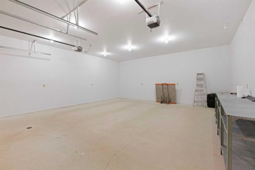 5 Eagle Drive, Waiparous, AB - Indoor Photo Showing Garage