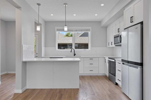 1006 Mahogany Boulevard Se, Calgary, AB - Indoor Photo Showing Kitchen With Upgraded Kitchen