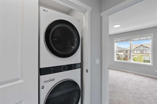 1006 Mahogany Boulevard Se, Calgary, AB - Indoor Photo Showing Laundry Room