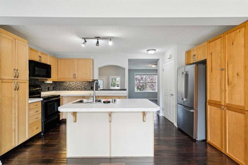 208 Everridge Way Sw, Calgary, AB - Indoor Photo Showing Kitchen With Double Sink