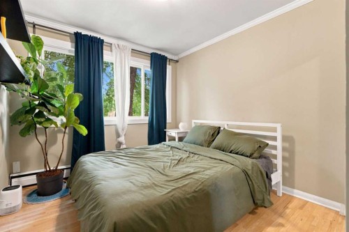 1212 Rosehill Drive Nw, Calgary, AB - Indoor Photo Showing Bedroom