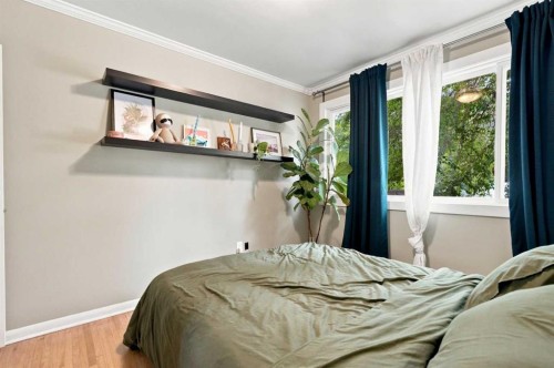 1212 Rosehill Drive Nw, Calgary, AB - Indoor Photo Showing Bedroom