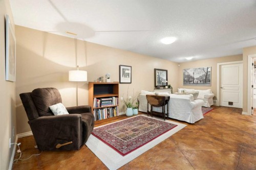 19 Rockmont Court Nw, Calgary, AB - Indoor Photo Showing Living Room