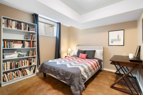 19 Rockmont Court Nw, Calgary, AB - Indoor Photo Showing Bedroom