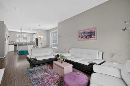 202 Copperpond Row Se, Calgary, AB - Indoor Photo Showing Living Room