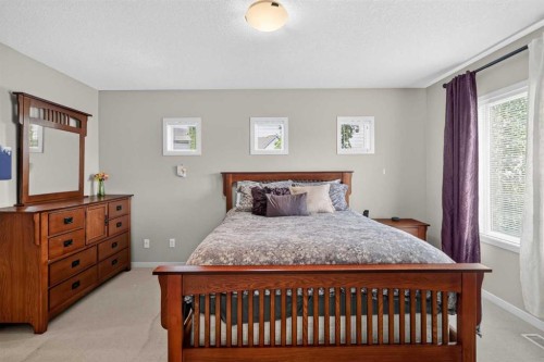 202 Copperpond Row Se, Calgary, AB - Indoor Photo Showing Bedroom