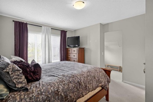 202 Copperpond Row Se, Calgary, AB - Indoor Photo Showing Bedroom