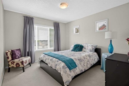 202 Copperpond Row Se, Calgary, AB - Indoor Photo Showing Bedroom