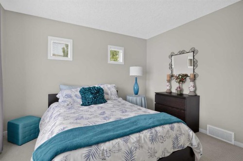 202 Copperpond Row Se, Calgary, AB - Indoor Photo Showing Bedroom