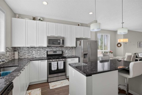 202 Copperpond Row Se, Calgary, AB - Indoor Photo Showing Kitchen With Upgraded Kitchen