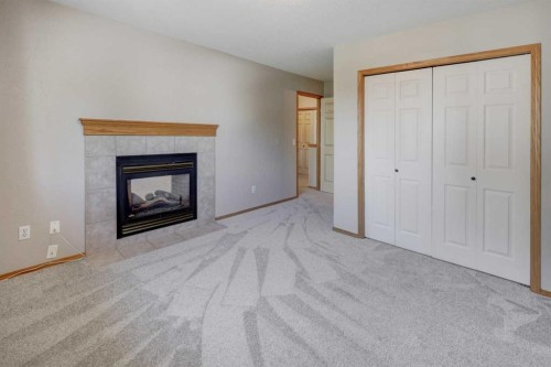 6711 Pinecliff Grove Ne, Calgary, AB - Indoor Photo Showing Living Room With Fireplace